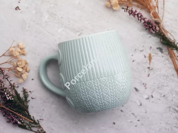 Kubek beczułka 0,4 L Altom Design - Sweterek miętowy 07.KBE.3202 Kubek beczułka 0,4 L Altom Design - Sweterek miętowy 07.KBE.3202